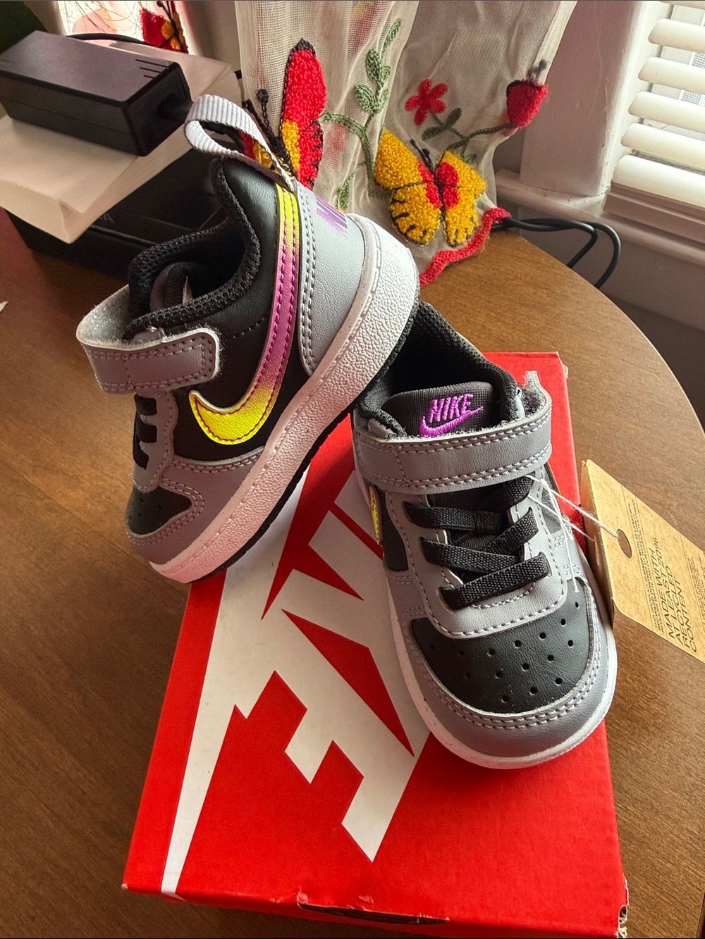 Nike Kids Gray and Black Sneakers with Iridescent Yellow-Pink Swoosh